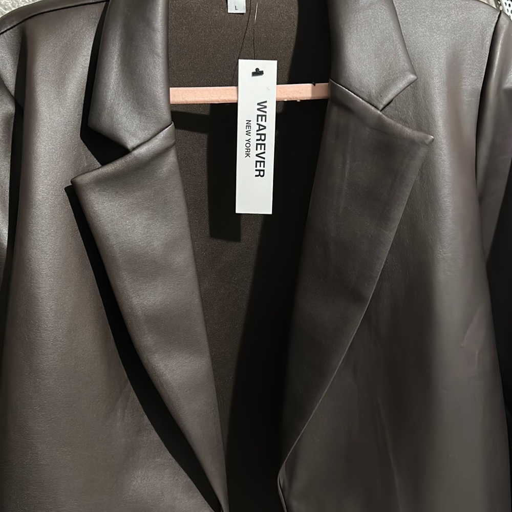 A wearever brown faux leather blazer.